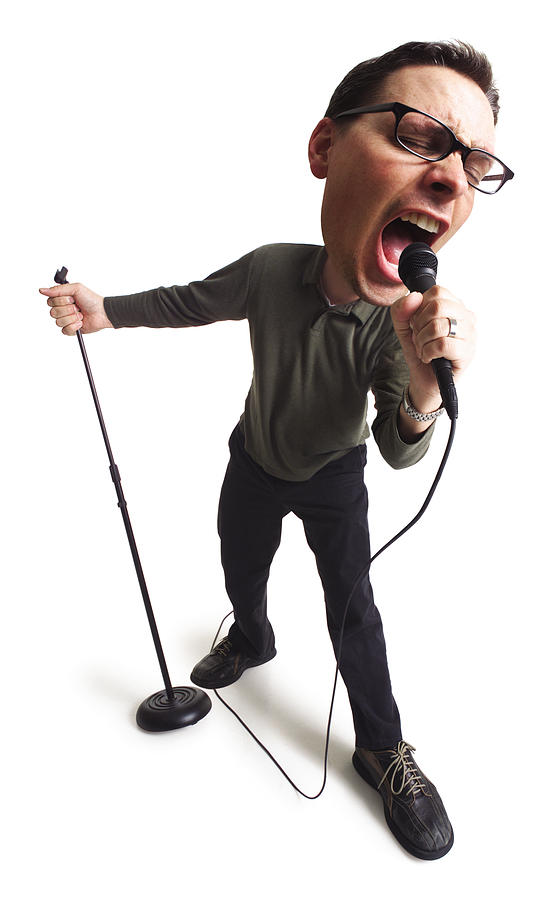 Caricature Of A Caucasian Male Singer As He Grabs The Microphone And Sings To His Hearts Delight Photograph by Photodisc