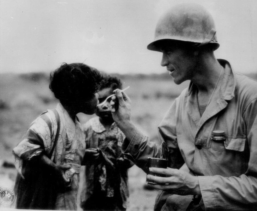 Vintage Photograph - Caring Solider by Retro Images Archive