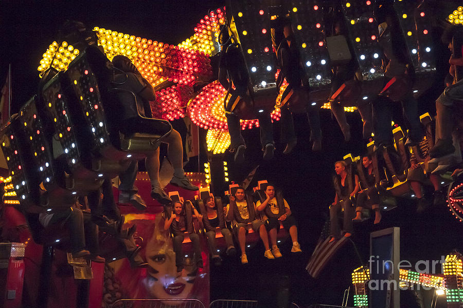 Carnival Ride at Night  at the Montgomery County Fair Photograph by William Kuta