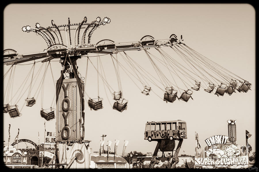 Carnival Rides in Motion Photograph by Imagery by Charly
