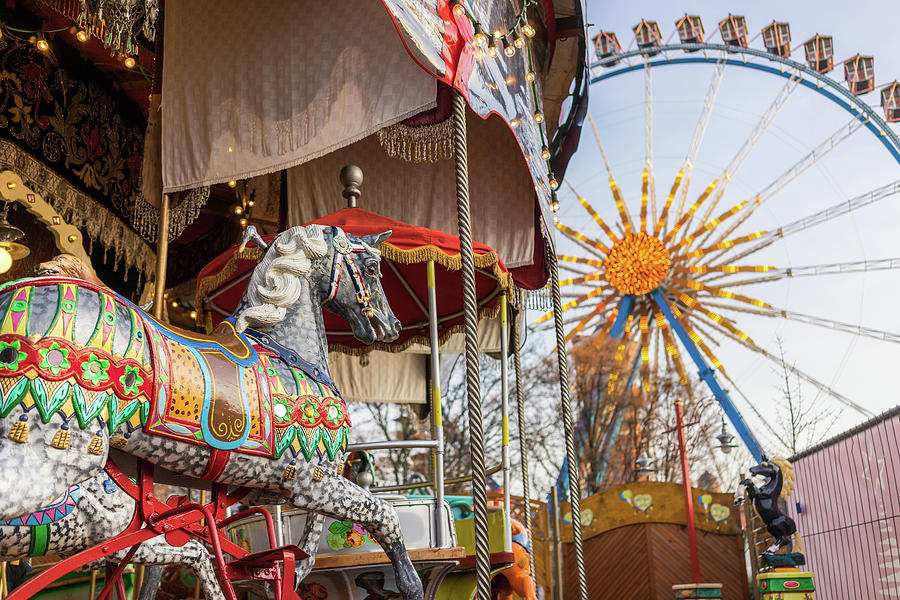 Carousel At A Carnival Or Festival With Photograph by Oleksandra Korobova