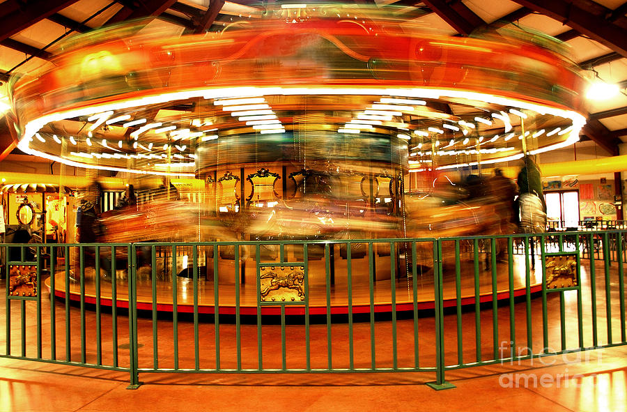 Carousel Ride  Photograph by Raymond Earley