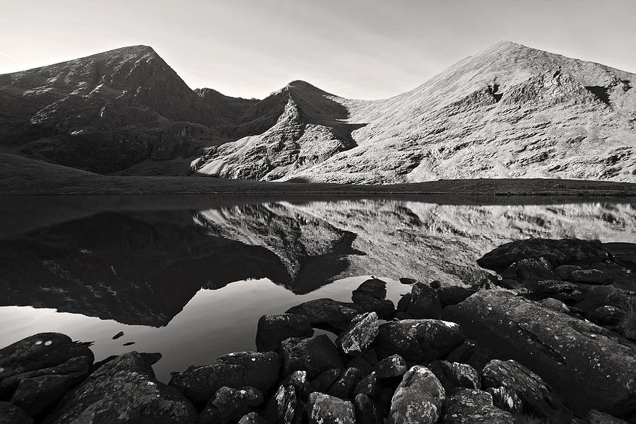 Black And White Photograph - Carrauntoohill calm morning reflection in black and white by Pierre Leclerc Photography