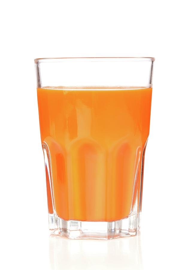Carrot Juice In Glass Photograph by Wladimir Bulgar