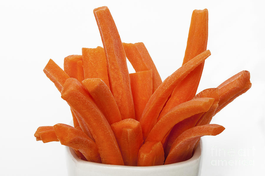 Carrot sticks ready for eating Photograph by Diane Macdonald