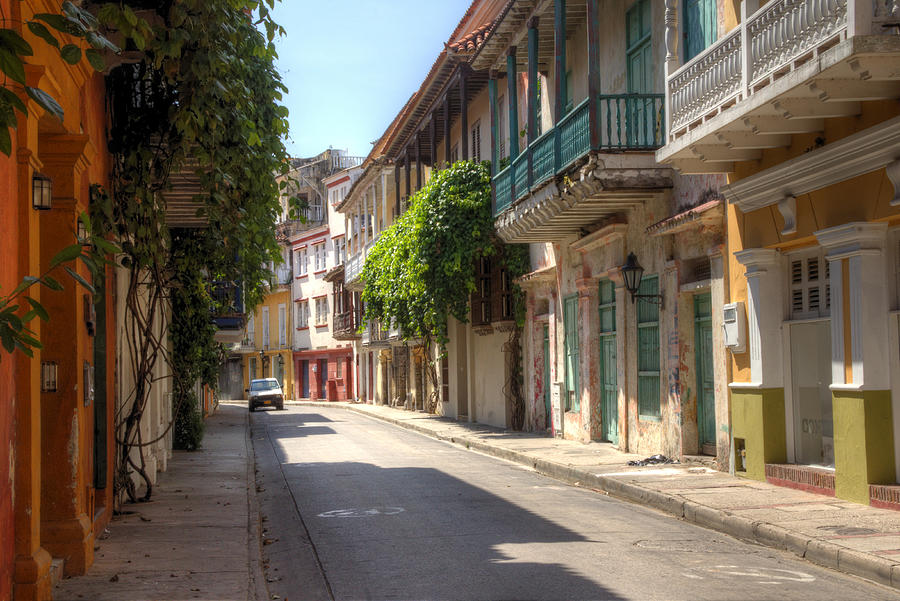Cartagena old colonial style street Photograph by Mariusz Kluzniak