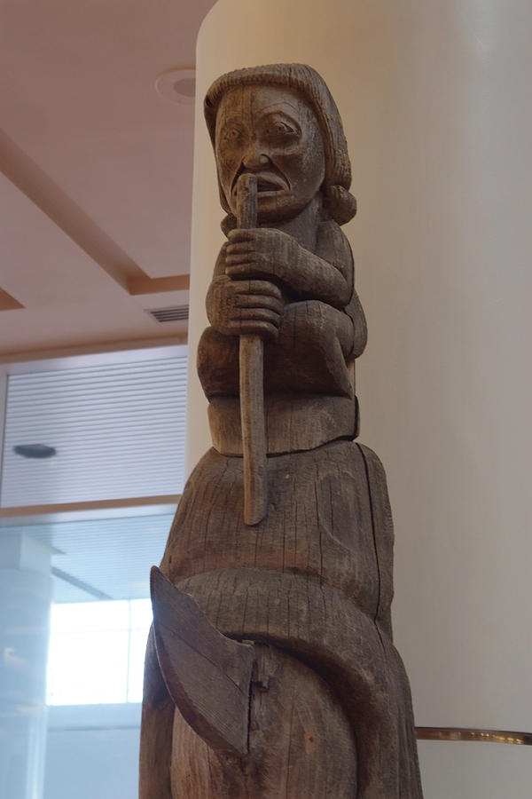 Totem Pole Photograph - Carved Totem Pole by Devinder Sangha