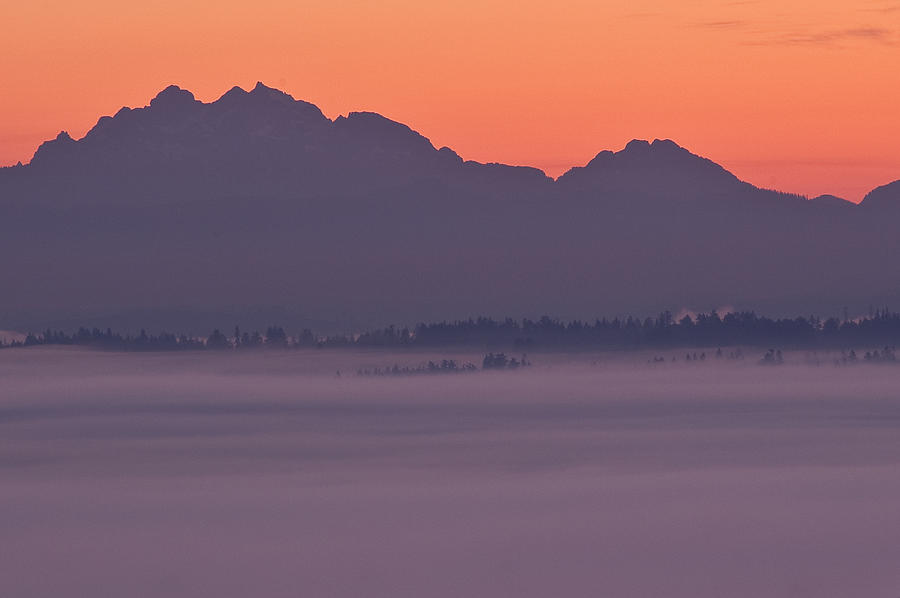 Cascade Mountain Range with fog in valley Photograph by Jim Corwin
