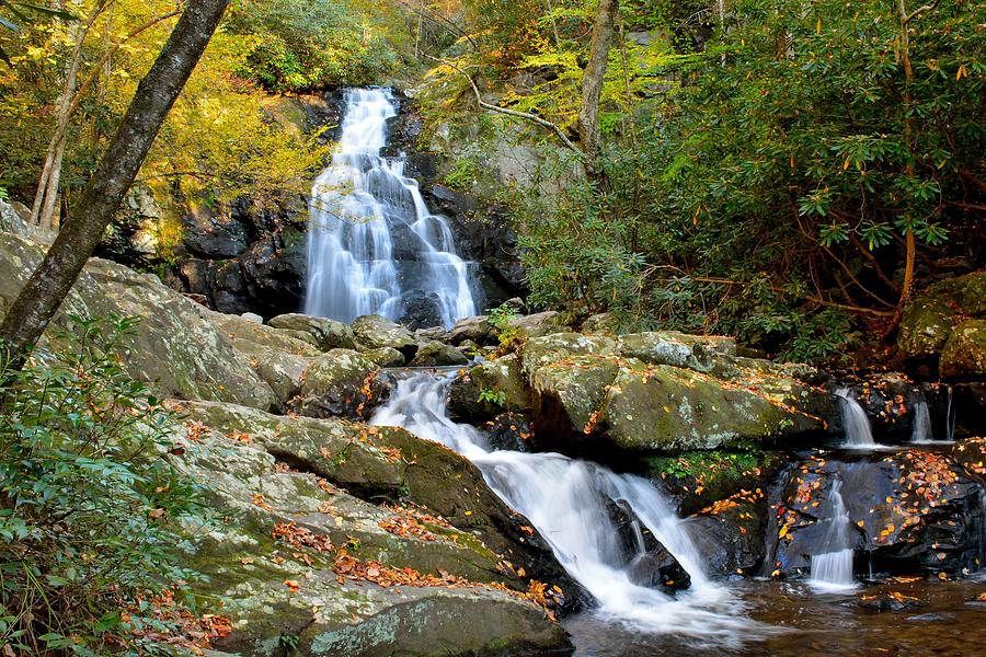 Cascading Waterfall With Fall Leaves Photograph