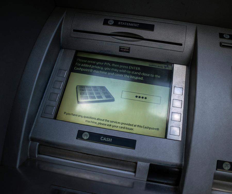 Cash Point Photograph by Robert Brook - Fine Art America