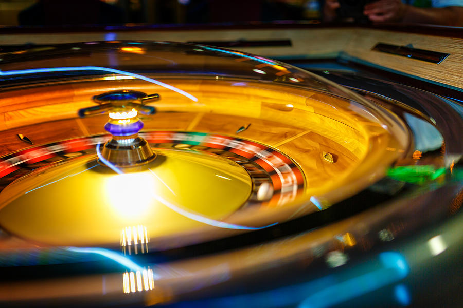 Casino electronic roulette wheel Photograph by Mbbirdy