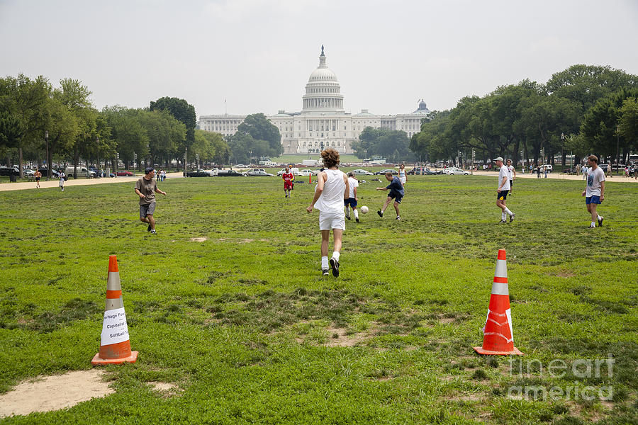 Casual soccer game on the Mall in Washington DC Photograph by William Kuta
