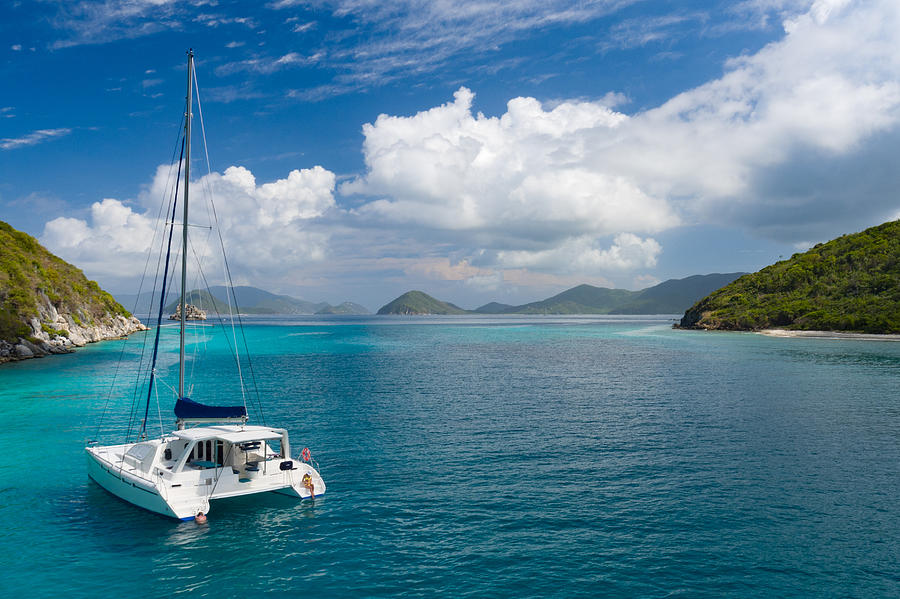 Catamaran anchored by Lovango Cay, US Virgin Islands Photograph by Cdwheatley