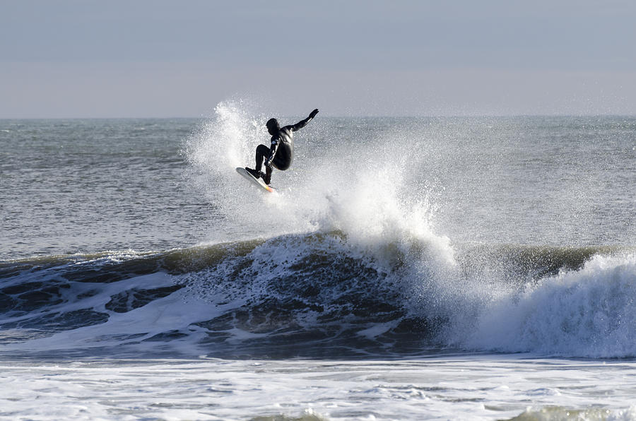 Catching Air Belmar NJ Winter Surf Photograph by Maureen E Ritter