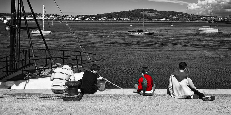 Catching Crabs In Red Photograph by Meirion Matthias