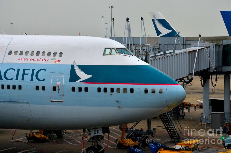Cathay Pacific 747 jumbo jet parked at Hong Kong airport Photograph by Imran Ahmed