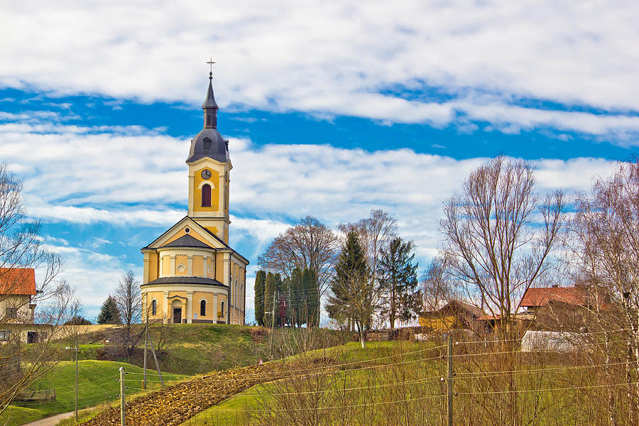 Catholic church on idyllic village hill Photograph by Brch Photography