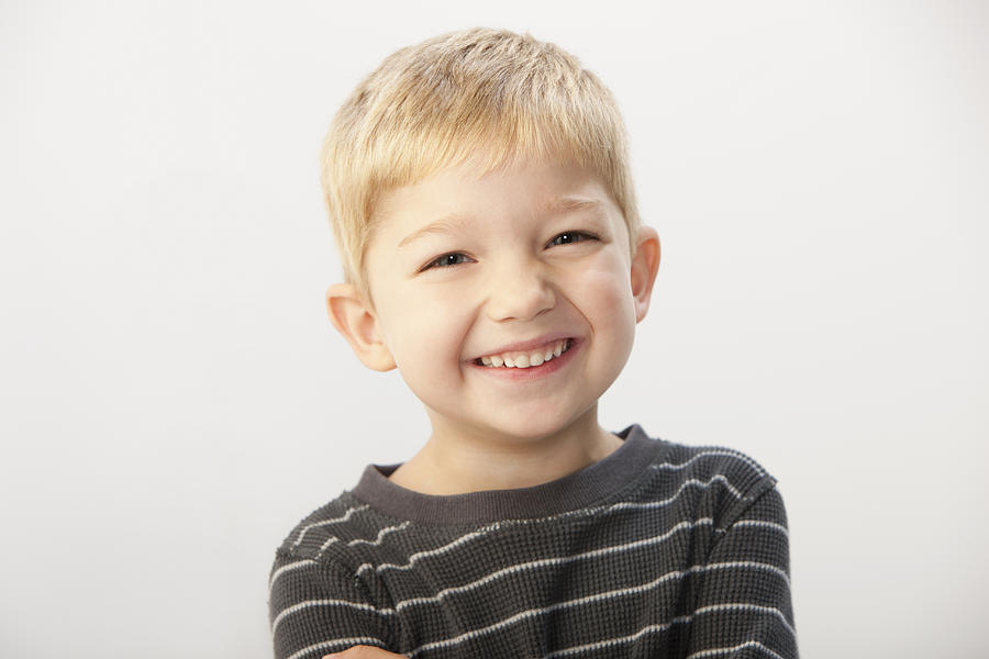 Caucasian boy smiling Photograph by Jose Luis Pelaez Inc