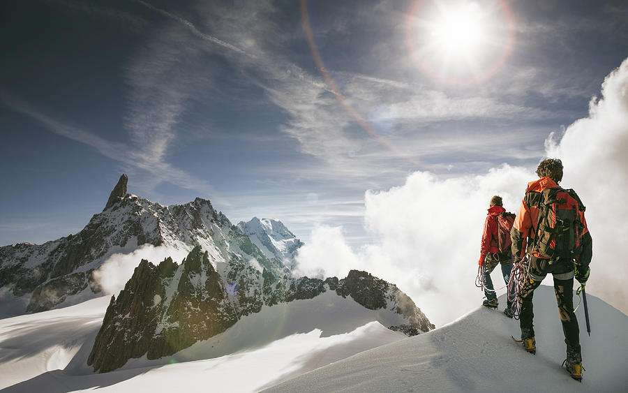 Caucasian hikers standing on snowy mountain top, Mont Blanc, Alps, France Photograph by Ac Productions