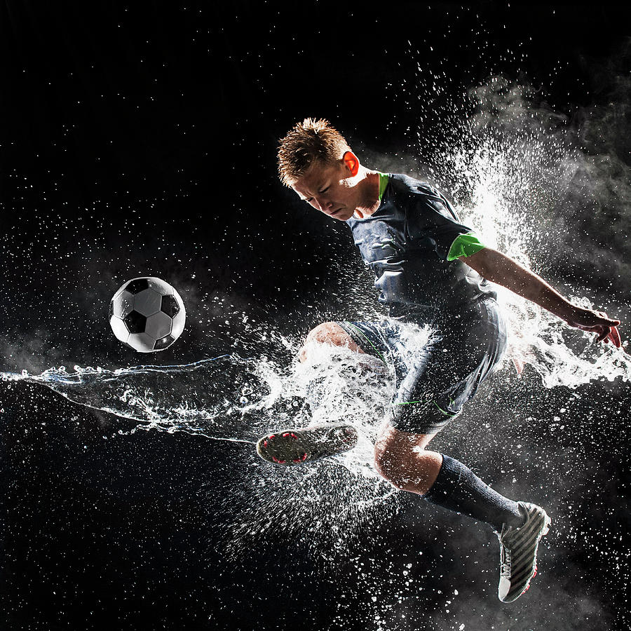 Caucasian Soccer Player Splashing In Photograph by Erik Isakson Caucasian Soccer Player Splashing In Photograph by Erik Isakson