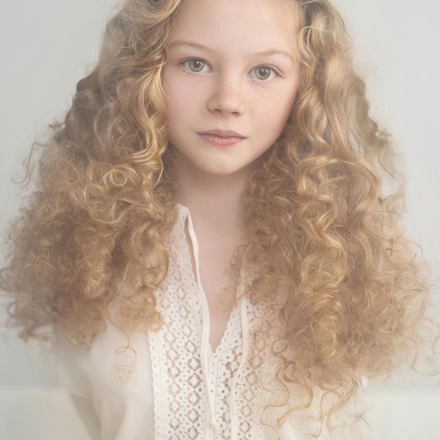 Caucasian teenage girl with curly hair Photograph by Vladimir Serov