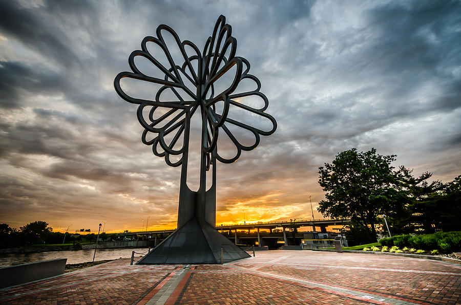 Cedar Rapids Five Seasons Tree at Sunset Photograph by Anthony Doudt