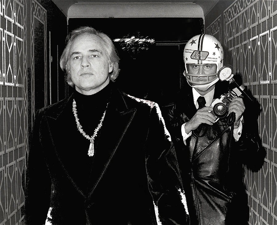 Celebrity stalker paparazzi photographer Ron Galella and Marlon Brando 1973-2014 Photograph by David Lee Guss