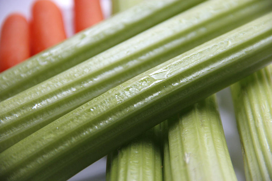 Celery Stalks And Baby Carrots Photograph by Science Source