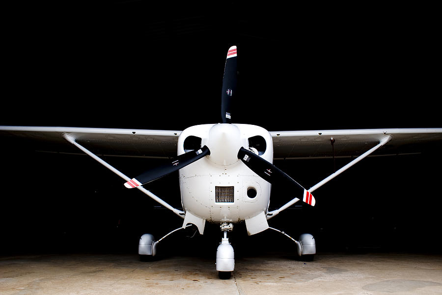 Cessna Dark Hanger Photograph by Paul Job