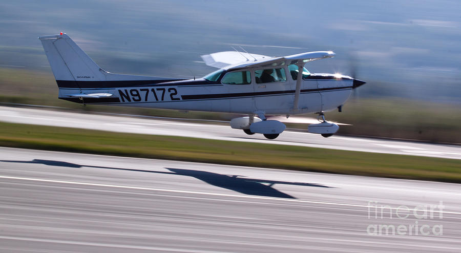 Airport Photograph - Cessna Takeoff by John Daly