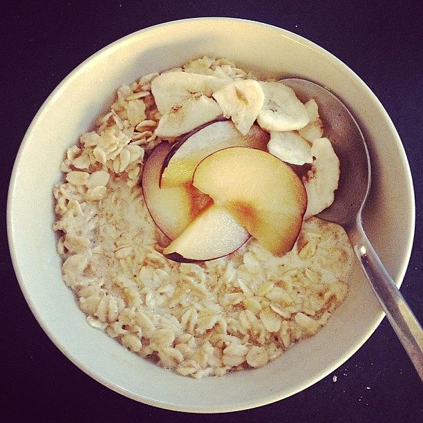 Nomnomnom Photograph - Chai Tea Oatmeal With Sliced Plums And by Kelly Black