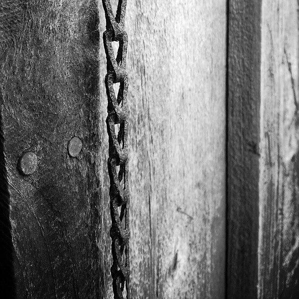 Chains And Wood Grains Photograph by Kyle Broderick