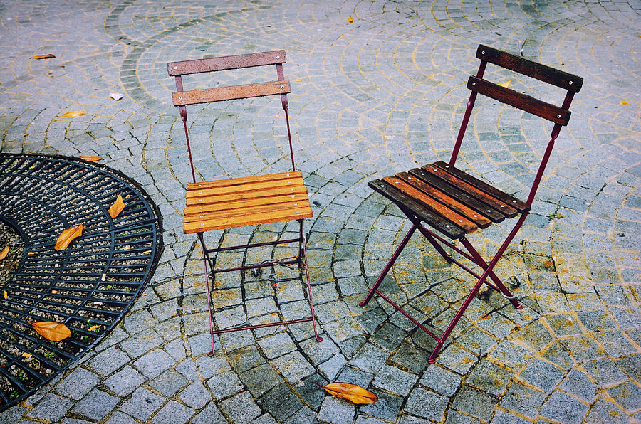 Chairs in a rainy Oporto Photograph by Pablo Lopez