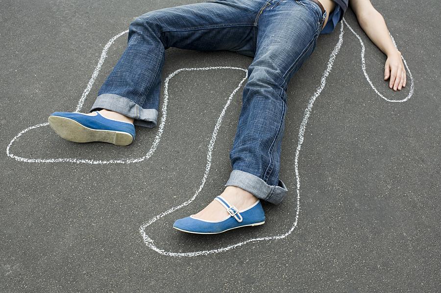 Chalk outline around a woman Photograph by Image Source