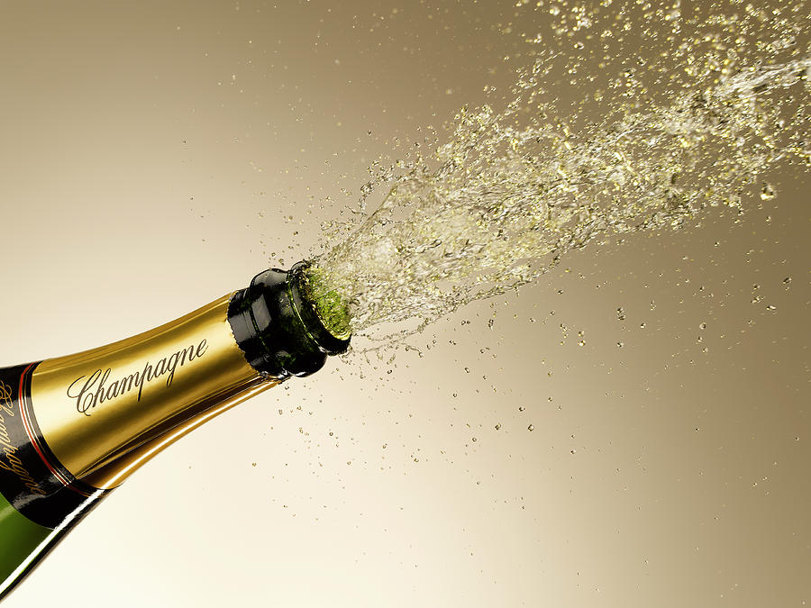 Champagne Exploding From Bottle Photograph by Andy Roberts