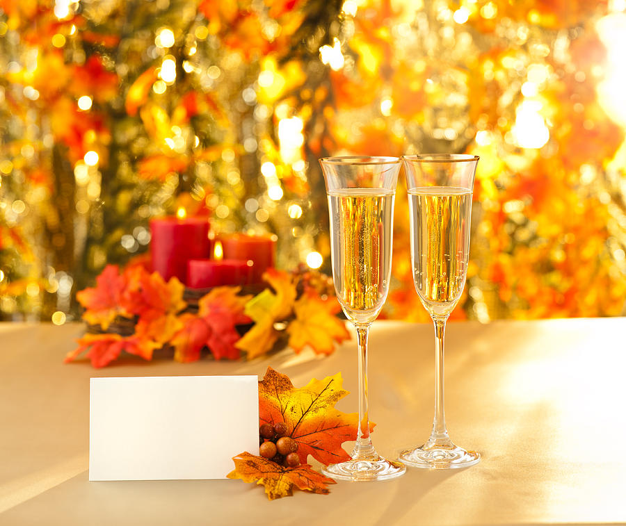 Champagne glasses for reception in front of autumn background Photograph by U Schade