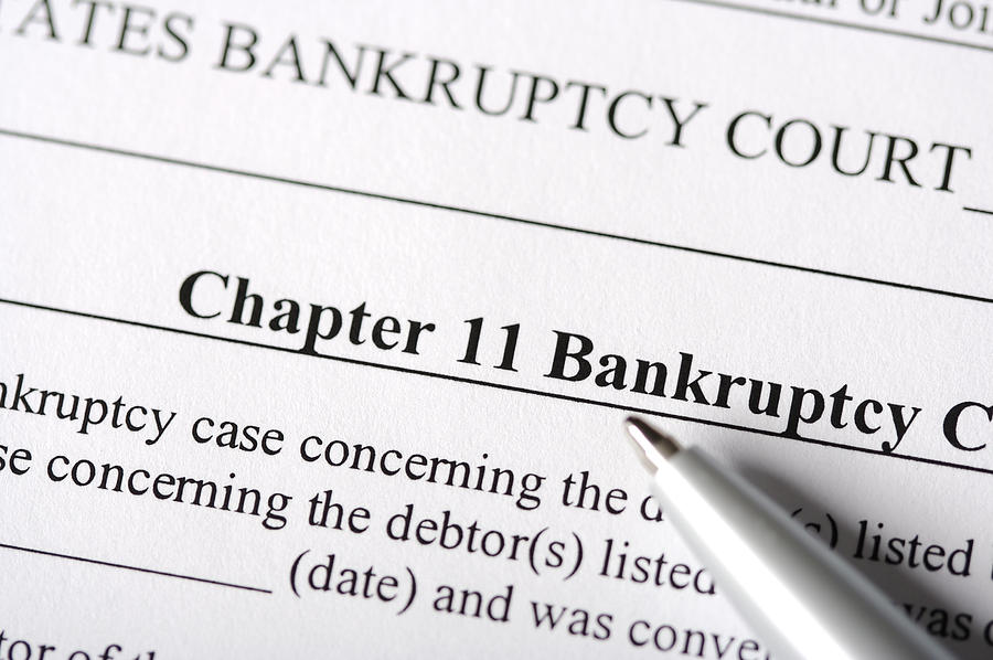 Chapter 11 Bankruptcy Paperwork Photograph by FuzzMartin
