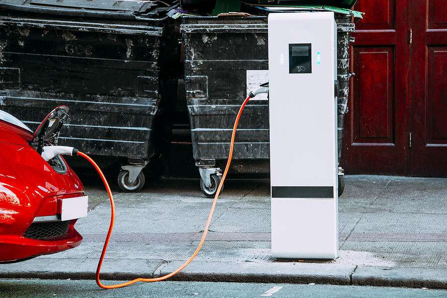 Charging an electric car Photograph by Photography taken by Mario Gutiérrez.