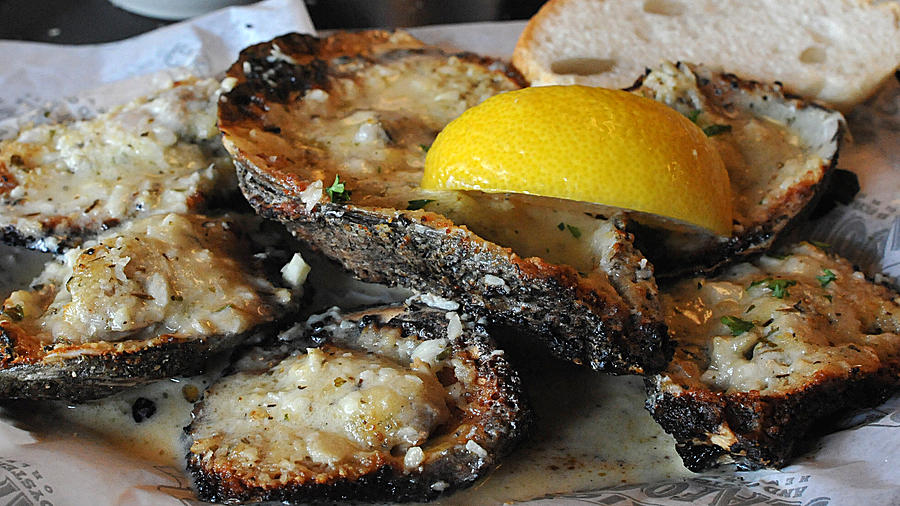 New Orleans Photograph - Chargrilled oysters by Steve Archbold