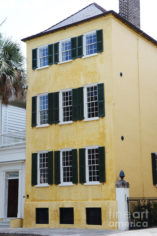 Charleston South Carolina Photograph - Charleston French Quarter Historical District Yellow House With Black Shutters - Historical Building by Kathy Fornal