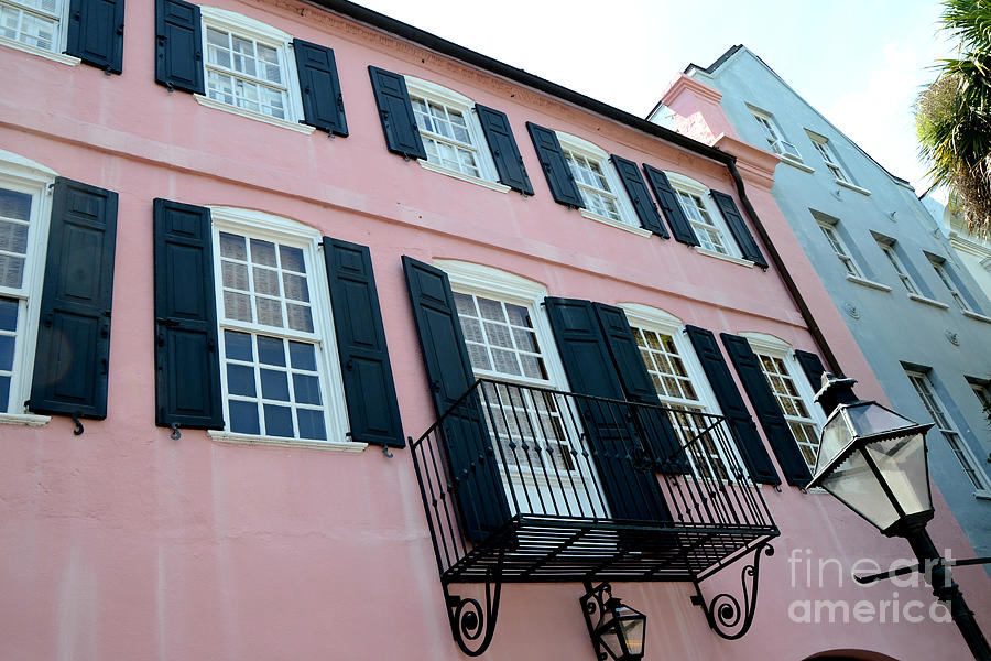 Charleston Rainbow Row Photograph - Charleston French Quarter Rainbow Row French Lace Iron Balconies Black and Pink Window Shutters  by Kathy Fornal