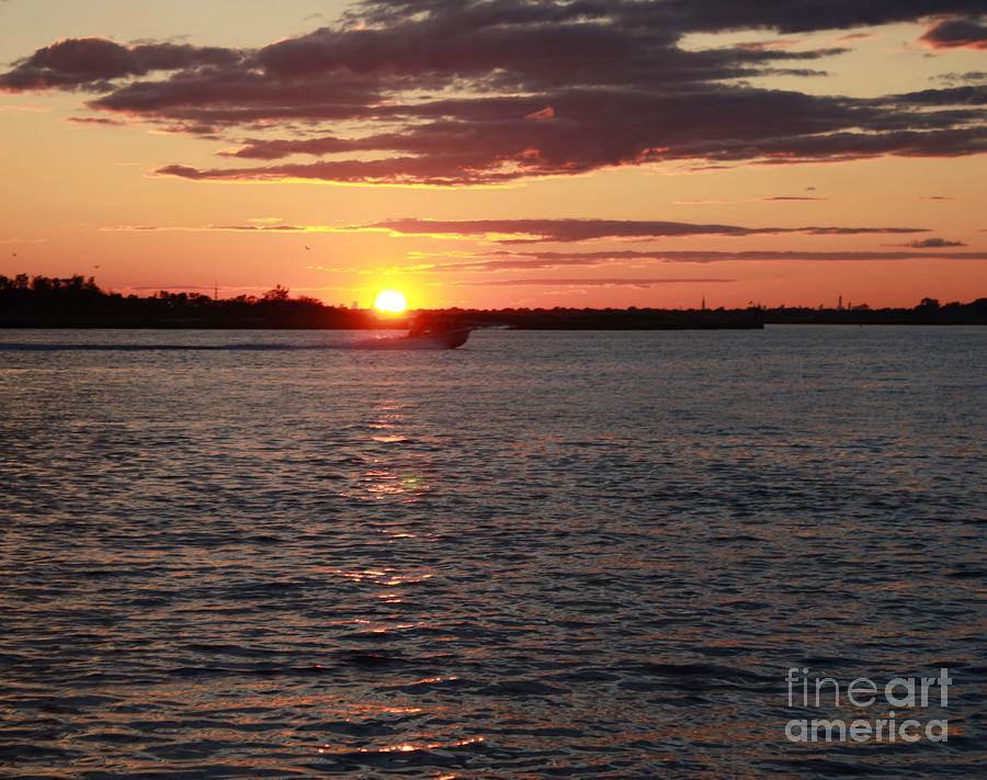 Chasing The Freeport Sunset Photograph by John Telfer
