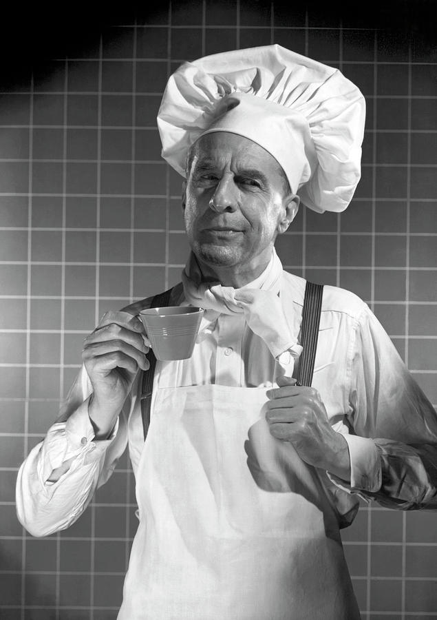 Chef With Coffee Cup Photograph by Underwood Archives