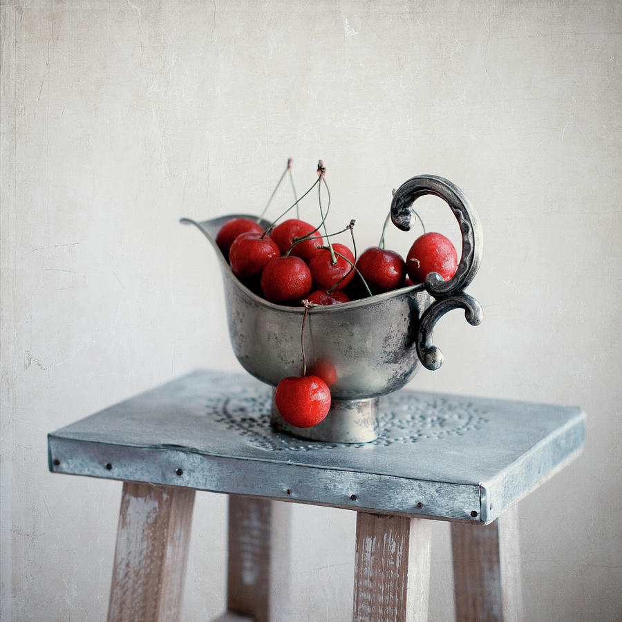 Cherries In Vintage Bowl On Stool Photograph by Copyright Anna Nemoy(xaomena)
