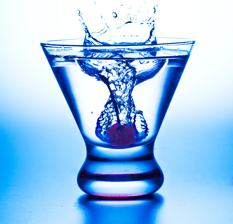 Cherry Splash with Blue Over-Tones Photograph by John Hoey