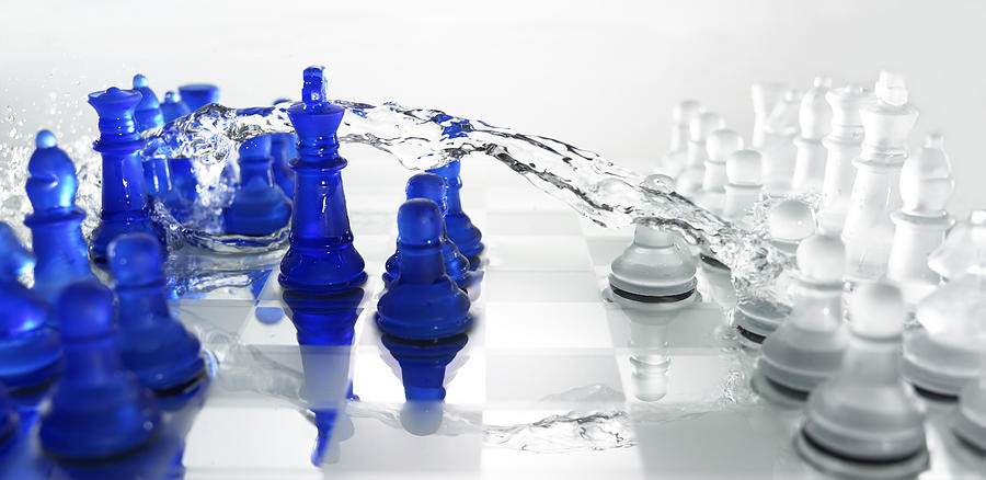 Chess pieces with water on board Photograph by Yamada Taro