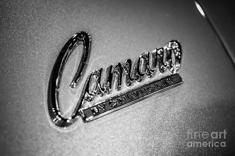 Black And White Photograph - Chevrolet Camaro Emblem by Paul Velgos