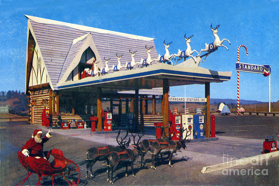 Christmas Photograph - Chevron gas station at Santas Village with reindeer and Carl Hansen by Monterey County Historical Society