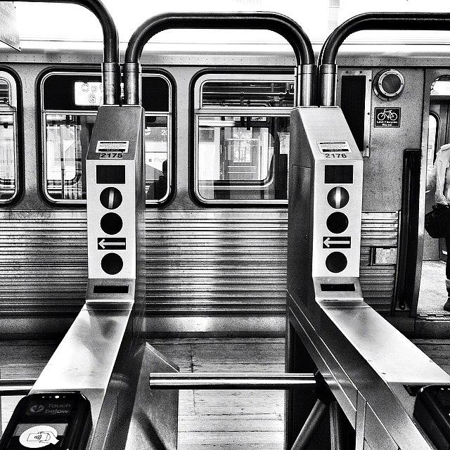 Chicago Photograph - Chicago L Train Gate In Black And White by Paul Velgos