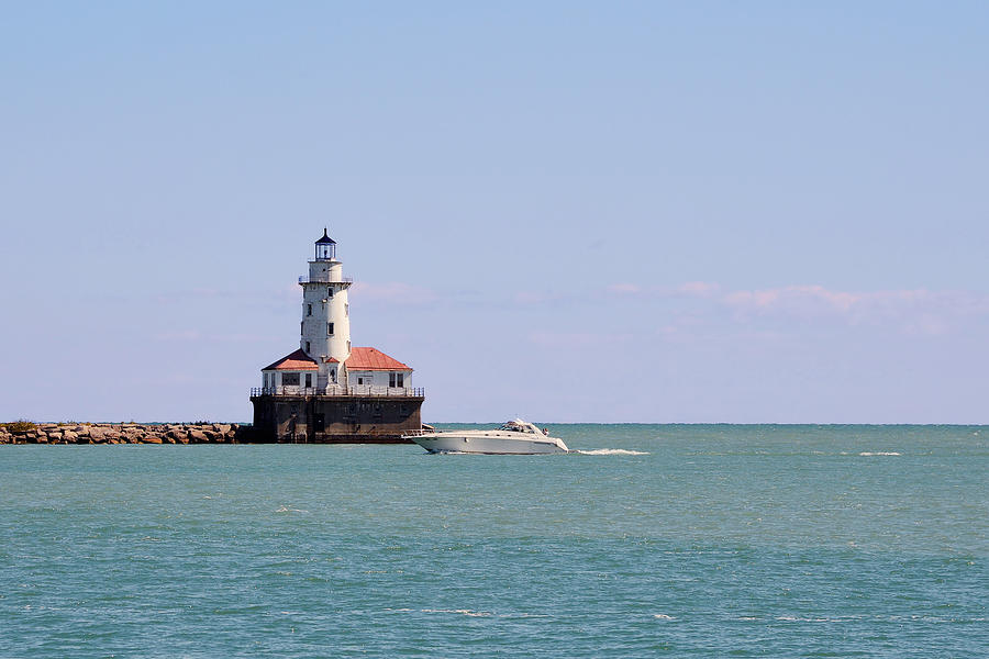 Chicago Photograph - Chicago Light House with Boat in Lake Michigan by Alexandra Till